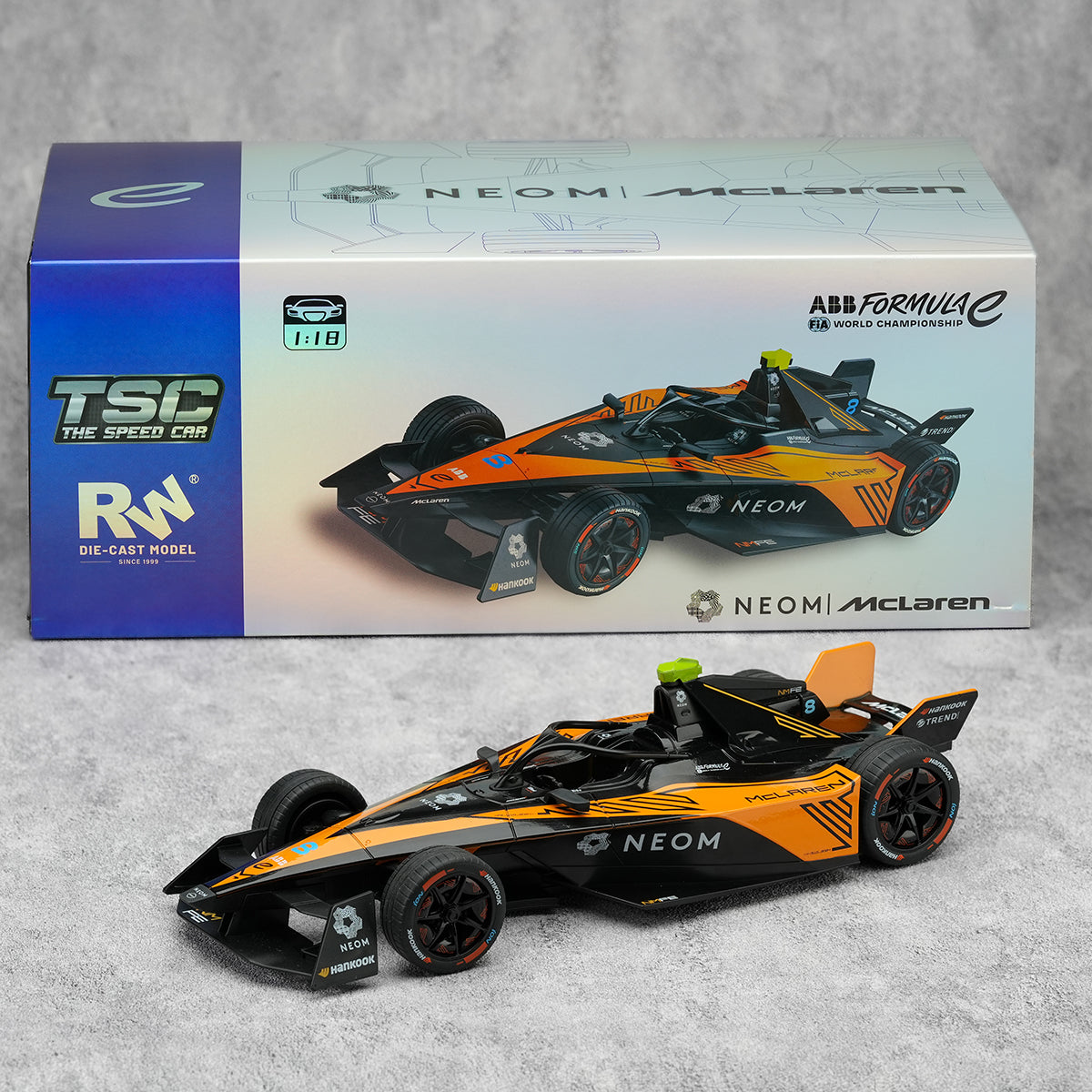 TOPTOY 1:18 Car Model The Speed Car Die-Cast Model of NEOM McLaren Formula E race car in black and orange, designed for racing toy car collections.